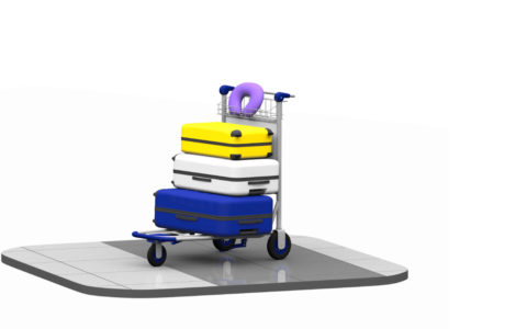 Suitcases stacked on luggage trolley