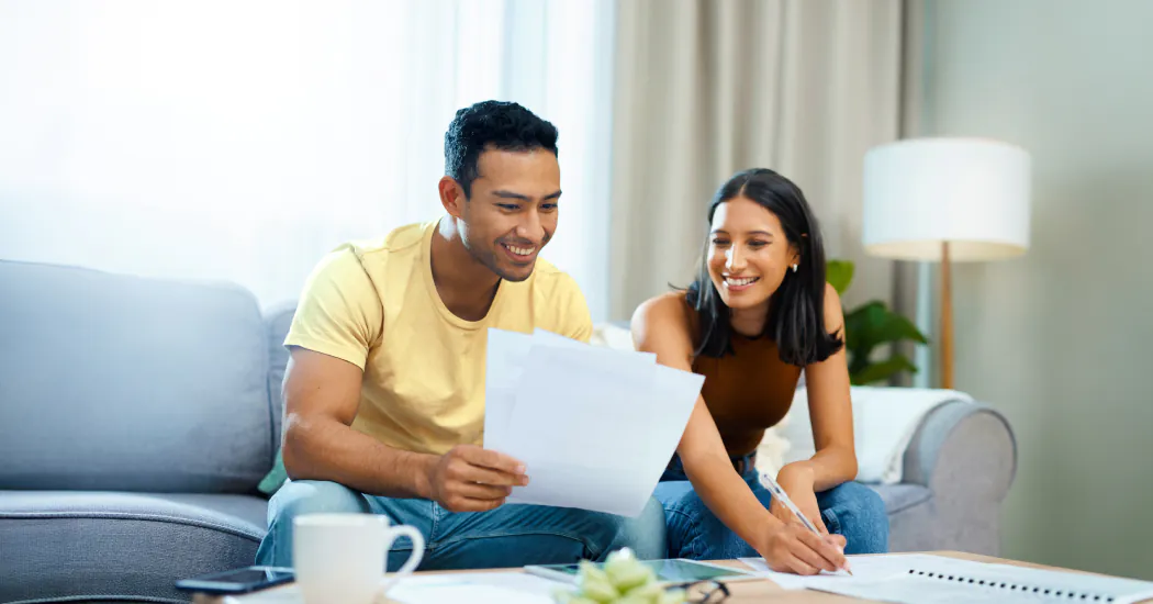 a couple review their insurance at home